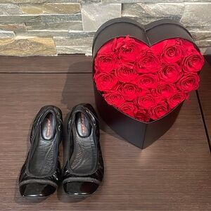 Authentic patent leather scrunch Prada flats